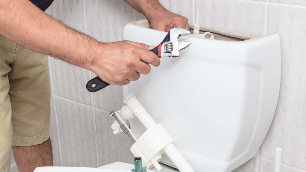 toilet being repaired